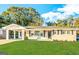 Charming one-story home with well-maintained lawn and covered carport at 2818 Lynda Pl, Decatur, GA 30032