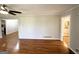 Inviting living room featuring gleaming hardwood floors and neutral paint at 2818 Lynda Pl, Decatur, GA 30032