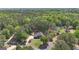 Aerial view of the home with mature trees in a quiet neighborhood at 65 Jacksons Vly, Sharpsburg, GA 30277