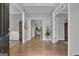 Inviting foyer with hardwood floors and views into the living spaces and dining room at 65 Jacksons Vly, Sharpsburg, GA 30277