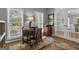 Bright home office with natural light and a view of lush landscaping at 65 Jacksons Vly, Sharpsburg, GA 30277