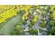 Beautiful aerial view of a home in a serene neighborhood, near a golf course at 110 Cadmium Ct, Peachtree City, GA 30269