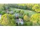 Overhead shot revealing a home adjacent to a lush golf course at 110 Cadmium Ct, Peachtree City, GA 30269