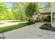 Expansive backyard with lush green grass and a patio perfect for outdoor entertaining at 110 Cadmium Ct, Peachtree City, GA 30269