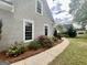 Charming home exterior featuring a well-manicured lawn and a curved sidewalk at 110 Cadmium Ct, Peachtree City, GA 30269