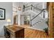 Elegant foyer with hardwood floors, staircase, and an open view to the dining room at 110 Cadmium Ct, Peachtree City, GA 30269
