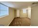 Finished basement featuring neutral walls, recessed lighting, carpet flooring, and natural light from two windows at 668 Fielding Sw Ln, Atlanta, GA 30311
