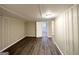 Basement featuring wood-look flooring and neutral walls with open door at 668 Fielding Sw Ln, Atlanta, GA 30311