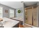 Relaxing main bathroom features a separate shower, a bathtub, double sinks and plenty of natural light at 220 Calli Ct, Mcdonough, GA 30252