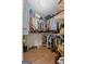 Spacious walk-in closet with extensive shelving and hardwood floors at 220 Calli Ct, Mcdonough, GA 30252