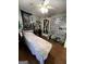 Unique bedroom featuring hardwood floors, ceiling fan and lots of wall decor at 5363 Forest Dr, Loganville, GA 30052