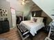 Comfortable bedroom with a sloped ceiling, a bed, and a walk-in closet at 5363 Forest Dr, Loganville, GA 30052