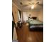 Bedroom with a comfortable bed, art and natural light at 5363 Forest Dr, Loganville, GA 30052