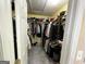 Walk-in closet with extensive storage racks and ample space for wardrobe organization at 5363 Forest Dr, Loganville, GA 30052