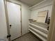 Spacious closet includes built-in shelving for storage at 5363 Forest Dr, Loganville, GA 30052