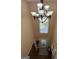 Foyer with a chandelier, window, and a door at 5363 Forest Dr, Loganville, GA 30052