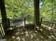 Rustic wooden gazebo overlooking the pond at 5363 Forest Dr, Loganville, GA 30052