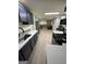 Modern kitchen featuring stainless steel appliances and bright countertops in a home at 5363 Forest Dr, Loganville, GA 30052