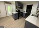 Cozy kitchen showcasing updated appliances and ample countertop space at 5363 Forest Dr, Loganville, GA 30052