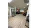 Recreation room featuring painted walls, neutral floors, comfortable seating, and a refrigerator at 5363 Forest Dr, Loganville, GA 30052