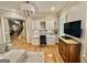 Home office with built-in cabinets, a large desk, and natural lighting at 100 Trotters Rdg, Fayetteville, GA 30215