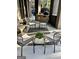 Outdoor patio seating area with comfortable chairs and a decorative plant at 100 Trotters Rdg, Fayetteville, GA 30215