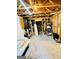 Unfinished basement with exposed framing and a carpeted floor at 2870 Willow Wisp Way, Cumming, GA 30040