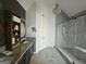 Contemporary bathroom featuring dual sinks, a large shower, and stylish fixtures at 2870 Willow Wisp Way, Cumming, GA 30040