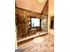 Modern bathroom featuring a frameless glass shower with a built-in bench and a shower head at 2870 Willow Wisp Way, Cumming, GA 30040