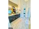 Modern bathroom with dual vanity, dark wood cabinets, decorative mirrors, and luxurious glass shower at 2870 Willow Wisp Way, Cumming, GA 30040