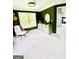 Bedroom featuring carpeted floors, modern decor, and large windows offering plenty of natural light at 2870 Willow Wisp Way, Cumming, GA 30040