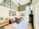 Cozy living room with vaulted ceilings, wood floors, a ceiling fan, and a brick fireplace at 2870 Willow Wisp Way, Cumming, GA 30040