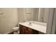 Bathroom featuring single sink vanity with solid surface countertops, and large mirror at 2867 Snapfinger Mnr, Decatur, GA 30035