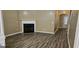 Spacious living room with hard surface flooring and a fireplace at 2867 Snapfinger Mnr, Decatur, GA 30035