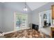 Bright breakfast nook featuring large windows, access to the backyard, and an open floorplan at 5640 Rolling Oaks Dr, Cumming, GA 30040
