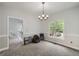 Bright dining room featuring plush carpeting and ample space for entertaining at 5640 Rolling Oaks Dr, Cumming, GA 30040