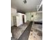 Spacious garage featuring a white door, refrigerator, and ample room at 732 Sandhill Shady Grove Rd, Carrollton, GA 30116