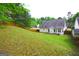 Private backyard with a fence and ample green space, providing a serene environment for outdoor enjoyment at 25 Pacific Ave, Sharpsburg, GA 30277