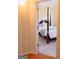 Bedroom with a four-poster bed and neutral carpet, seen from the doorway at 25 Pacific Ave, Sharpsburg, GA 30277