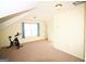 Versatile bonus room with natural light and neutral tones offers flexible living space options at 25 Pacific Ave, Sharpsburg, GA 30277