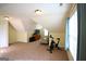 Versatile bonus room with neutral carpet and paint, perfect for a home gym or play area at 25 Pacific Ave, Sharpsburg, GA 30277
