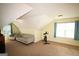 Large bonus room with dual seating areas offers a flexible and comfortable living space at 25 Pacific Ave, Sharpsburg, GA 30277