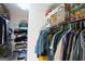 Walk-in closet with wire shelving and hanging rods for optimal organization at 25 Pacific Ave, Sharpsburg, GA 30277