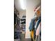 Walk-in closet with wire shelving and hanging rods for optimal storage at 25 Pacific Ave, Sharpsburg, GA 30277