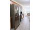This kitchen has stainless steel appliances, tile floors, and an eat-in dining area at 25 Pacific Ave, Sharpsburg, GA 30277