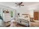 Bedroom with natural light features light colors, stool and ceiling fan at 400 Peachtree Pkwy, Peachtree City, GA 30269
