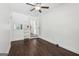 Clean and spacious bedroom with wood floors, a ceiling fan, and plenty of natural light at 400 Peachtree Pkwy, Peachtree City, GA 30269