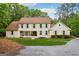 Charming two-story home with a welcoming front porch and well-manicured lawn at 400 Peachtree Pkwy, Peachtree City, GA 30269