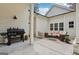 Cozy outdoor patio featuring a grill and seating area perfect for entertaining at 400 Peachtree Pkwy, Peachtree City, GA 30269