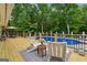 Relaxing pool deck with lounge chairs overlooking the sparkling blue pool at 400 Peachtree Pkwy, Peachtree City, GA 30269